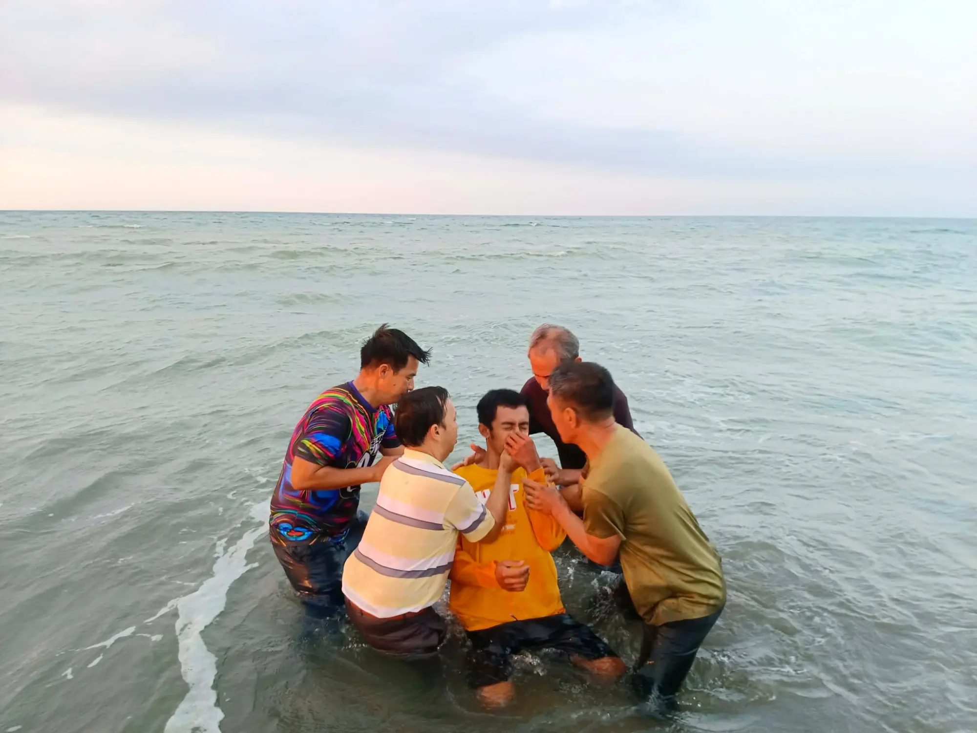 Second believer being baptized in Pamplona